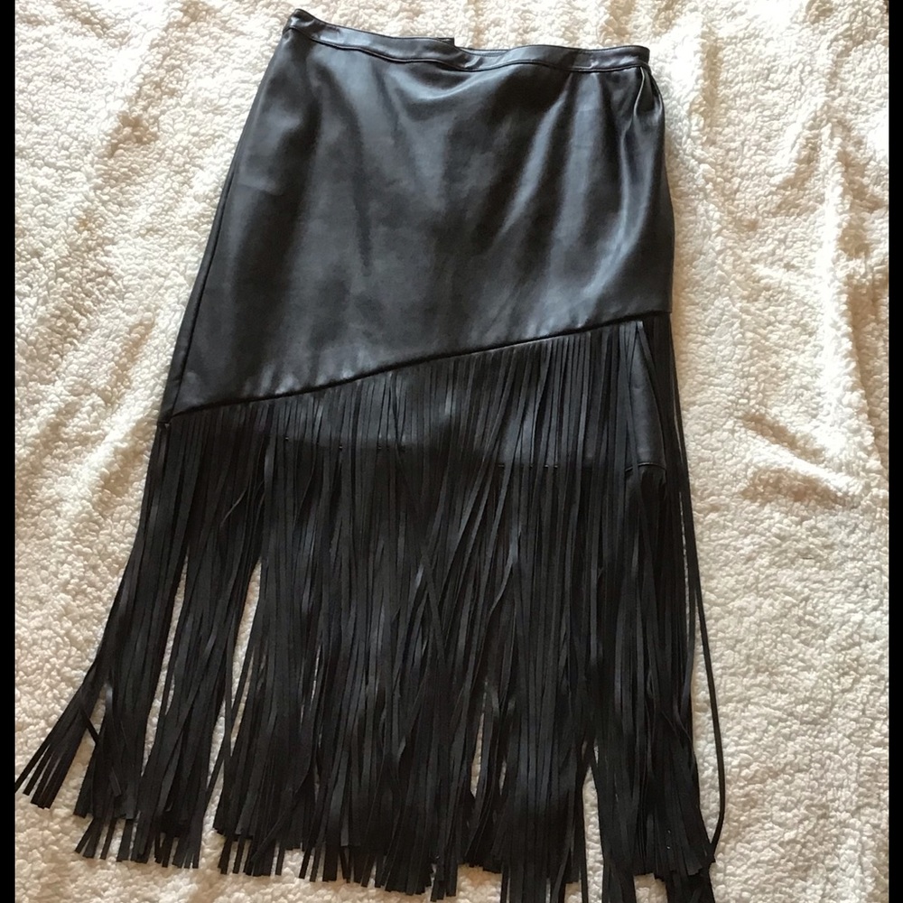 Fringed faux leather skirt.